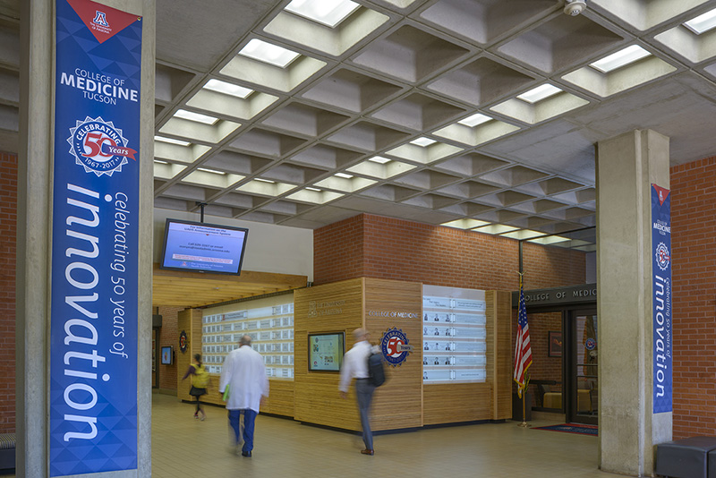 Lobby featuring banners, 3-D signage, touchscreen graphics